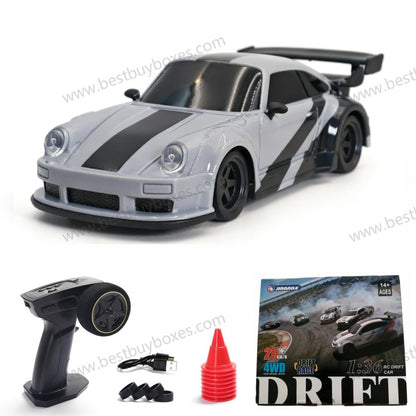 A jiabaile 1/36 drift racing car remote control set featuring a gray and black toy car, a black handheld remote control, a red cone, and a drift racing box on a white background.