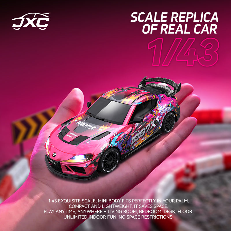 Pink toy car held in a hand with a pink background, featuring JXC branding.
