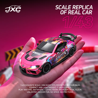 Pink toy car held in a hand with a pink background, featuring JXC branding.